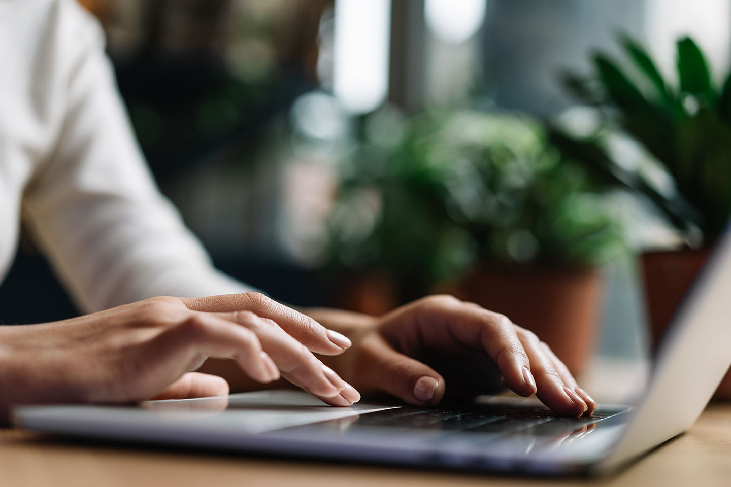 Copywriter creating compelling marketing content on a laptop